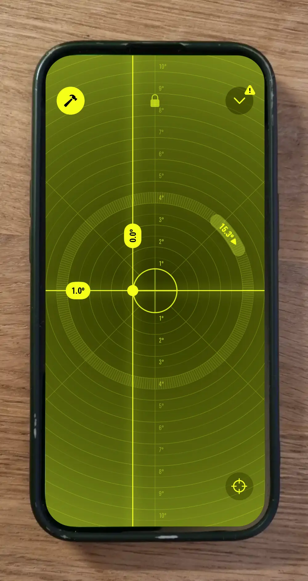 Handy liegt flach auf einem Tisch und zeigt 0,0° in der Wasserwaagen-App